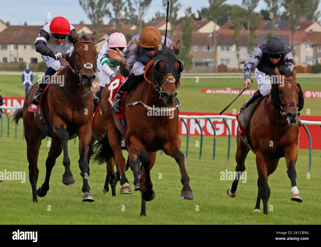 Summerghand ridden by jockey Daniel Tudhope (centre) wins the Virgin Bet Ayr Gold Cup Handicap during the Virgin Bet Ayr Gold Cup day at Ayr Racecourse, Ayr. Picture date: Saturday September 17, 2022. Stock Photo