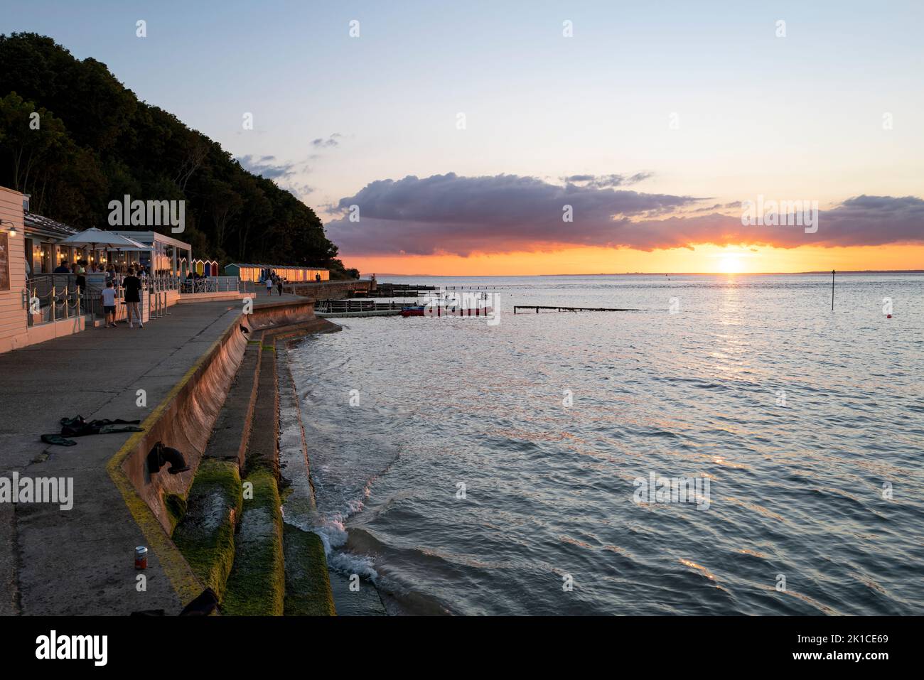 Sunset at The Hut Restaurant & Bar Colwell Bay on the Isle of Wight Hampshire Stock Photo