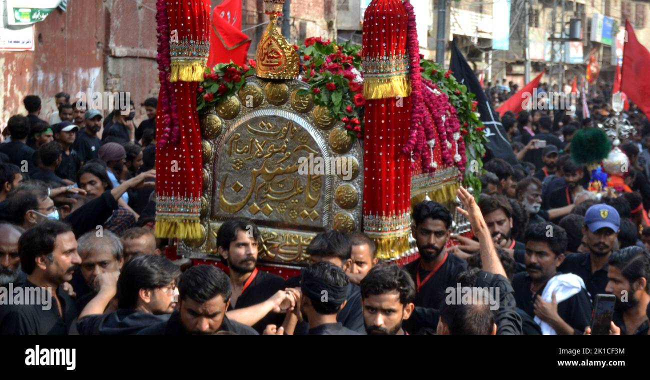 A large number of mourners attend the Chehlum procession to commemorate the martyrdom of Hazrat Imam Hussain (AS), grandson of Holy Prophet (SAWW) Stock Photo