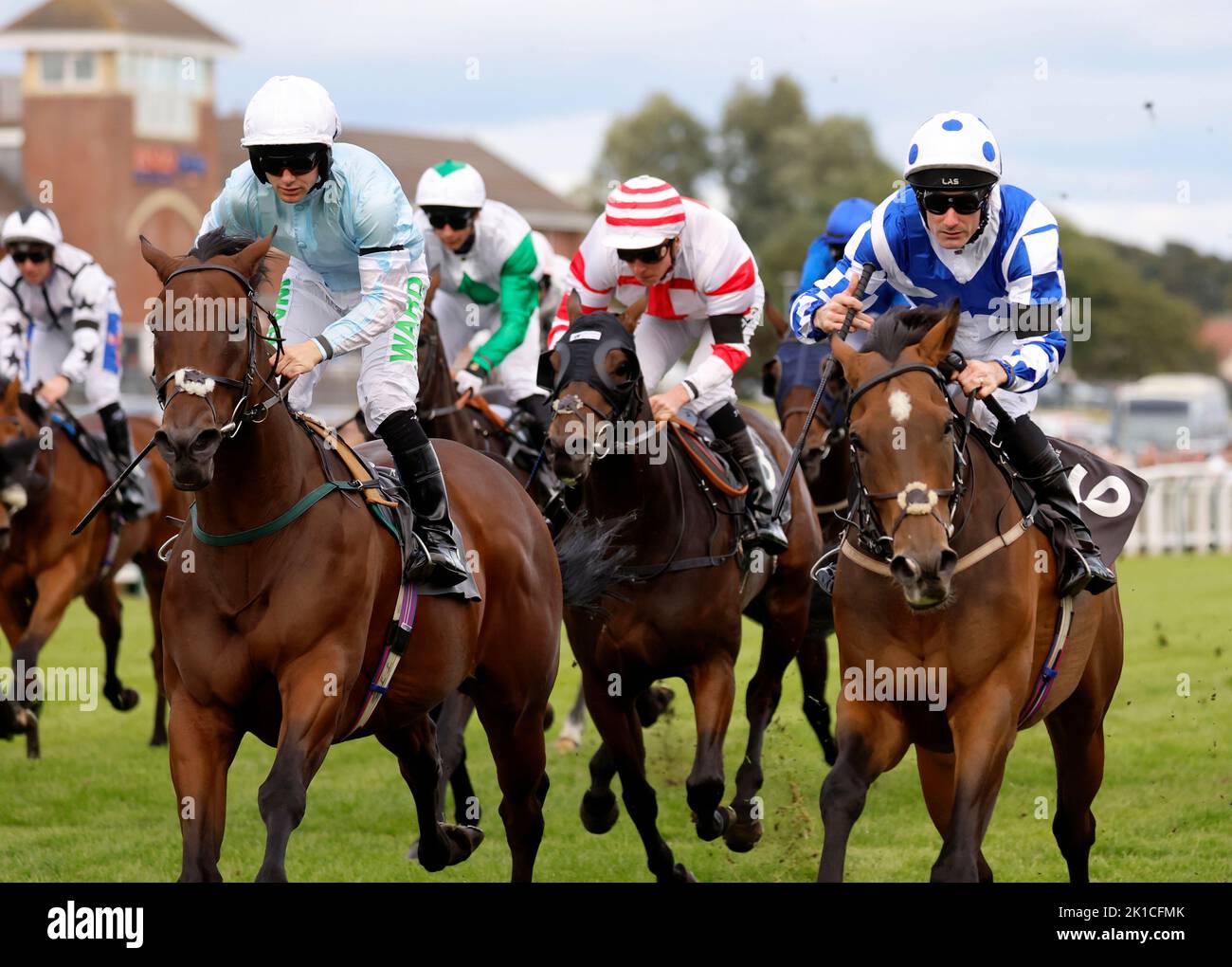 Abduction ridden by jockey Paul Mulrennan (right)wins the Get Home Safe With Thistle Cabs Handicap during the Virgin Bet Ayr Gold Cup day at Ayr Racecourse, Ayr. Picture date: Saturday September 17, 2022. Stock Photo