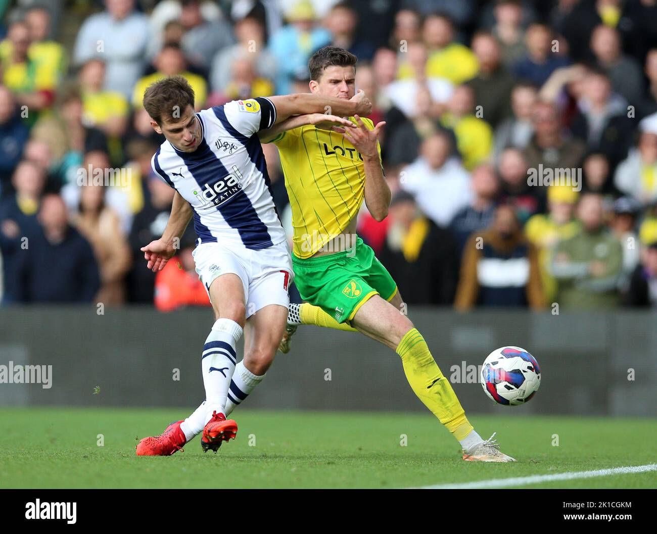 Norwich City's Sam Byram (right) and West Bromwich Albion's Jayson Molumby battle for the ball during the Sky Bet Championship match at Carrow Road, Norwich. Picture date: Saturday September 17, 2022. Stock Photo