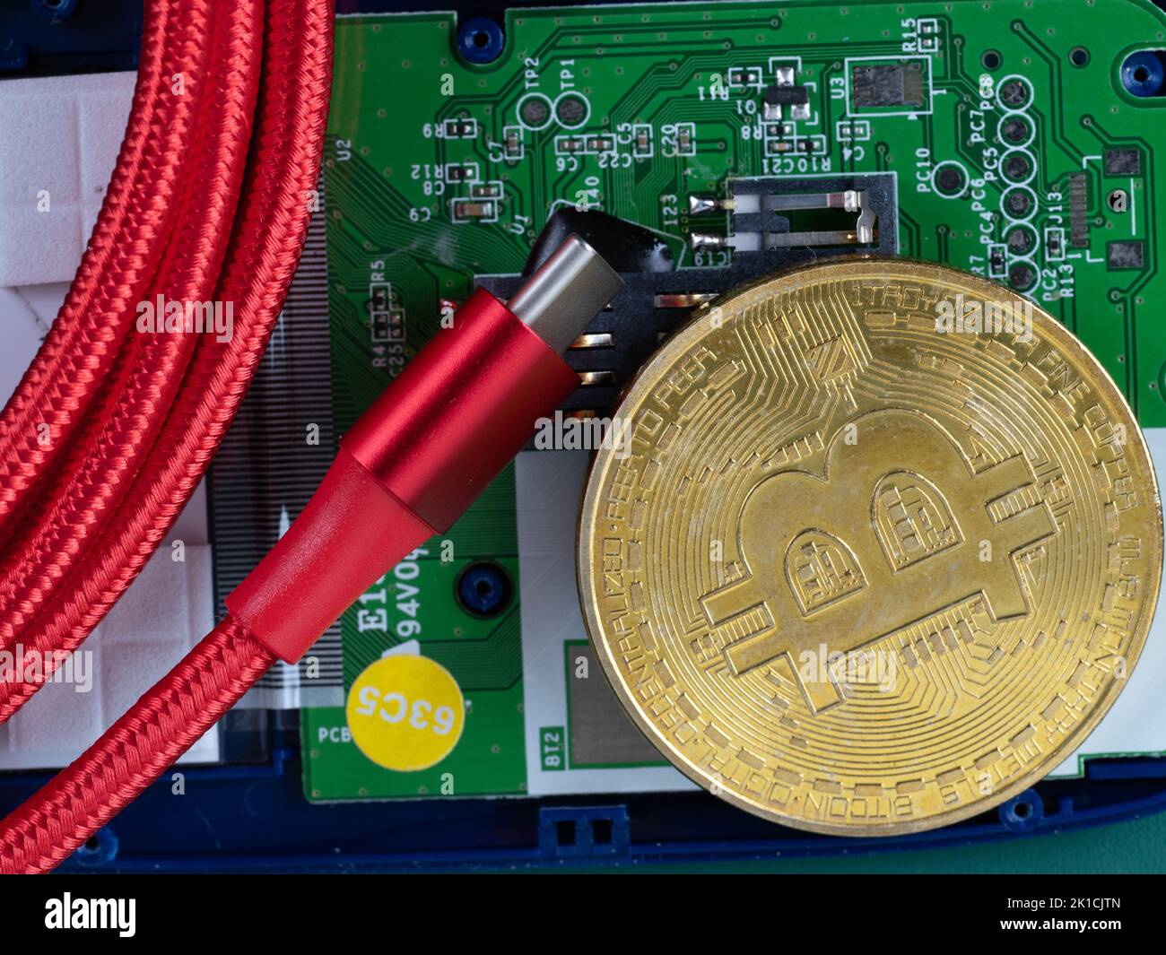 on a printed circuit board and red USB trpe C cable Stock Photo