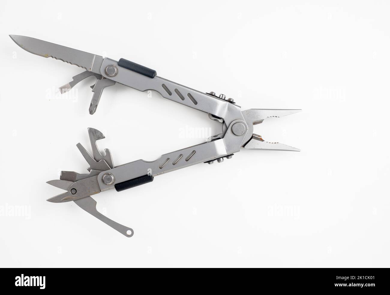 stainless steel multitool with all the accessories open Stock Photo