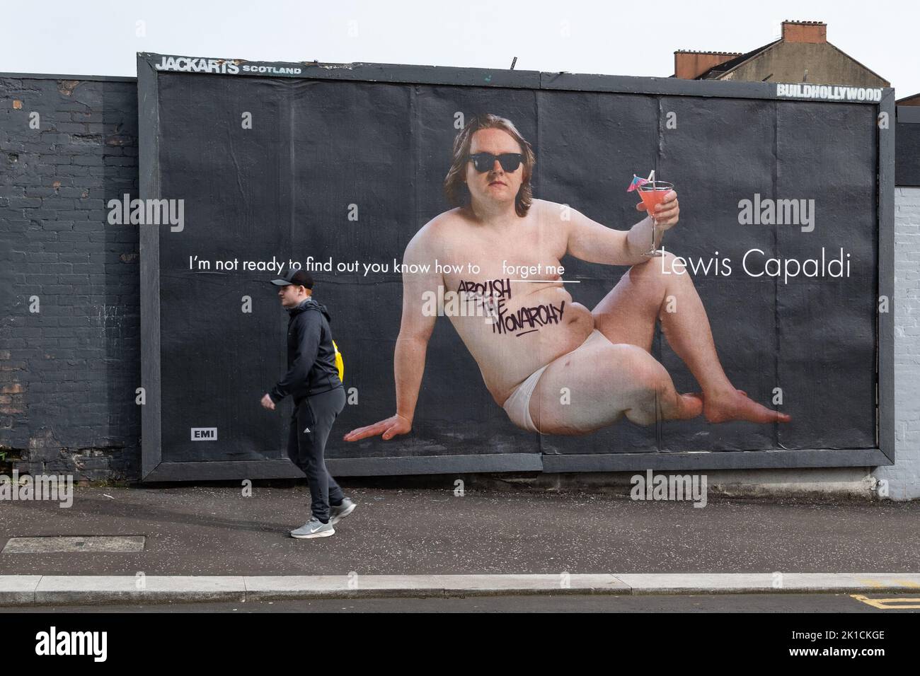 Glasgow, Scotland, UK - Abolish the Monarchy graffiti on Lewis Capaldi billboard Credit: Kay Roxby/Alamy Live News Stock Photo