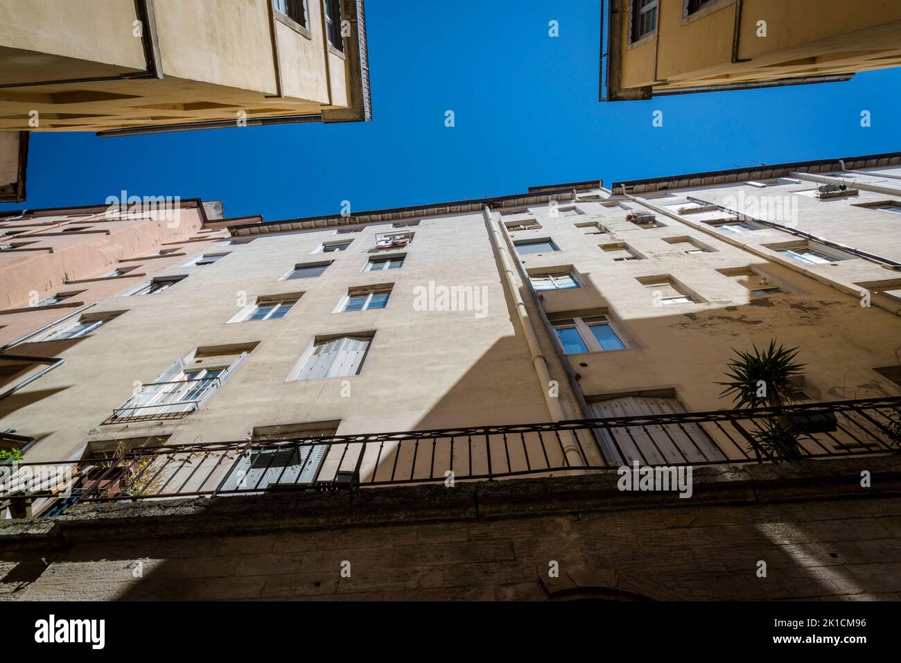 Looking up tall residential building in the La Croix-Rousse district, formerly silk manufacturers neighbourhood during 19th century, now a fashionable Stock Photo