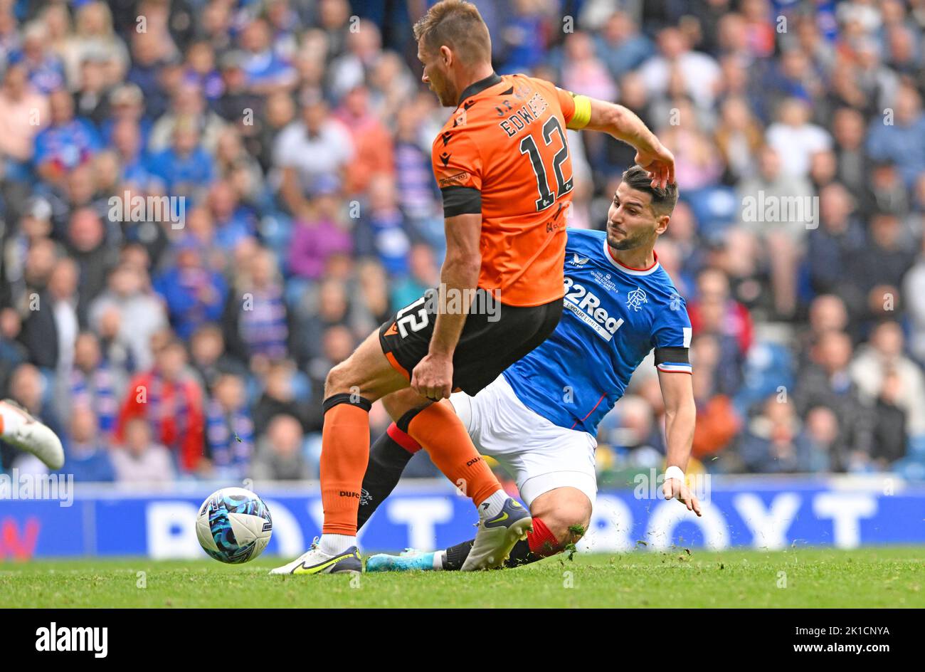 Glasgow, UK. 17th September 2022. Ryan Edwards of Dundee Utd and Antonio Colak of Rangers during