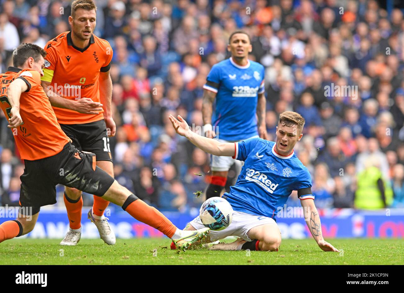 Glasgow, UK. 17th September 2022. Liam Smith of Dundee Utd and Charlie McCann of Rangers during