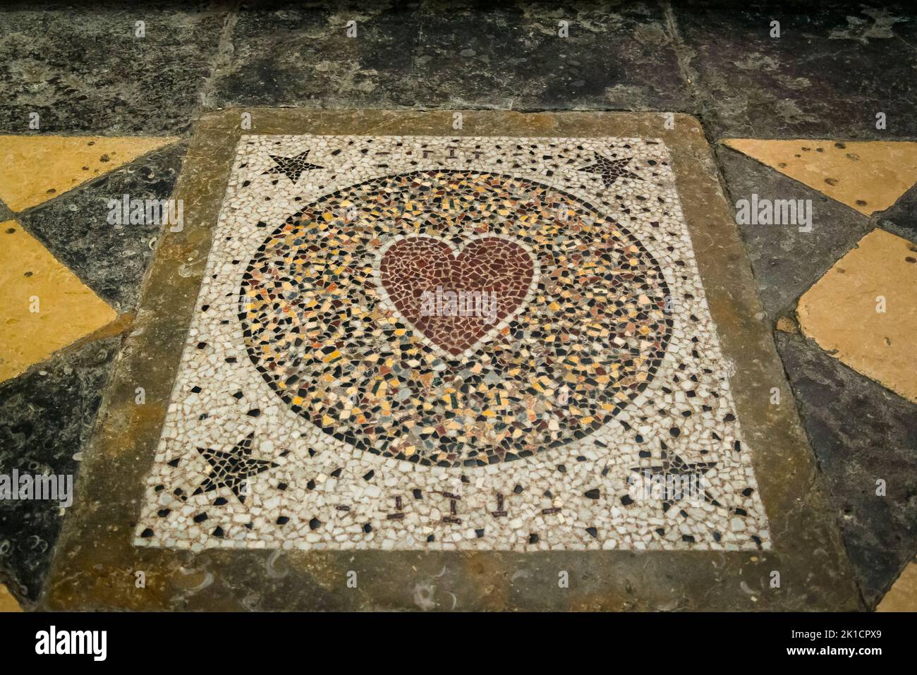 Heart floor mosaic, Vienne Cathedral, a medieval Roman Catholic church dedicated to Saint Maurice, Vienne, France Stock Photo