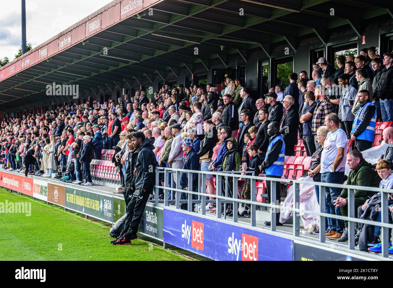 Fans of both sides observe the minute's silence for HM Queen Elizabeth 2nd during the Sky Bet League 2 match between Salford City and Tranmere Rovers at Moor Lane, Salford on Saturday 17th September 2022. Stock Photo