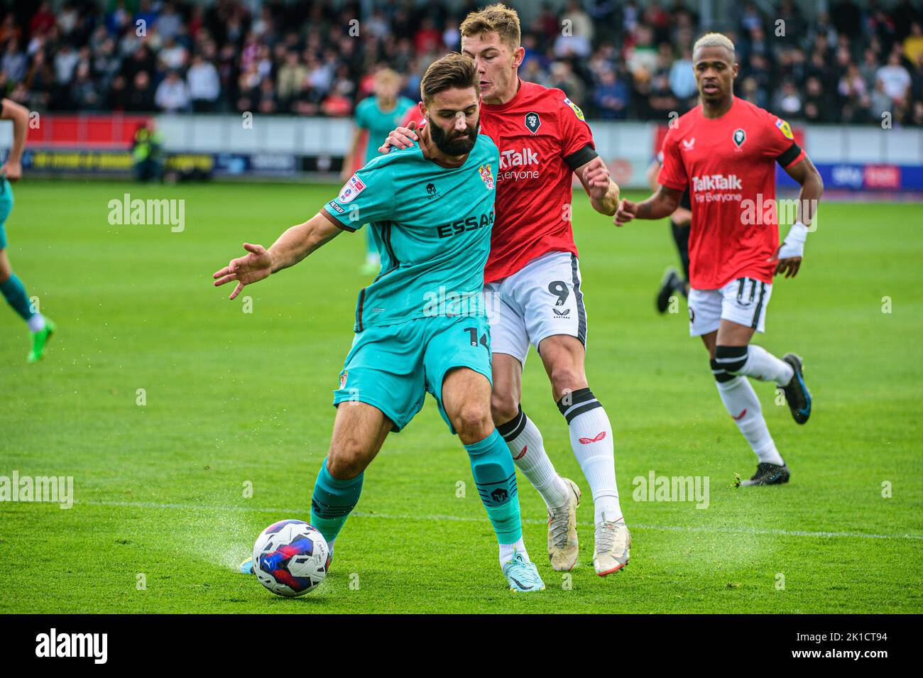 Callum Hendry of Salford City is tackled by Jordan Turnbull of Tranmere Rovers during the Sky Bet League 2 match between Salford City and Tranmere Rovers at Moor Lane, Salford on Saturday 17th September 2022. Stock Photo