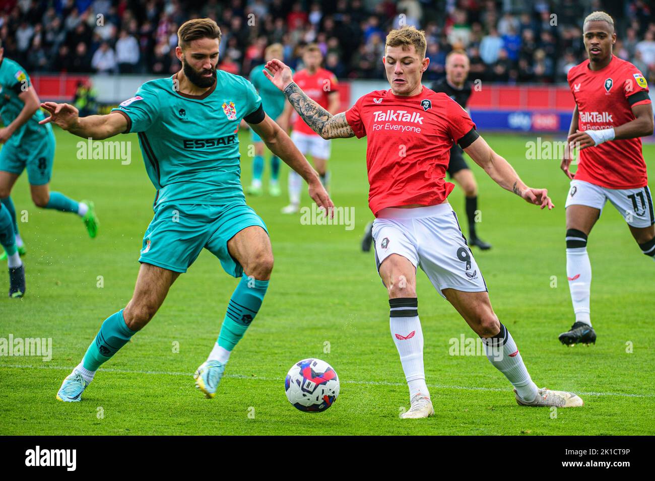 Callum Hendry of Salford City is tackled by Jordan Turnbull of Tranmere Rovers during the Sky Bet League 2 match between Salford City and Tranmere Rovers at Moor Lane, Salford on Saturday 17th September 2022. Stock Photo