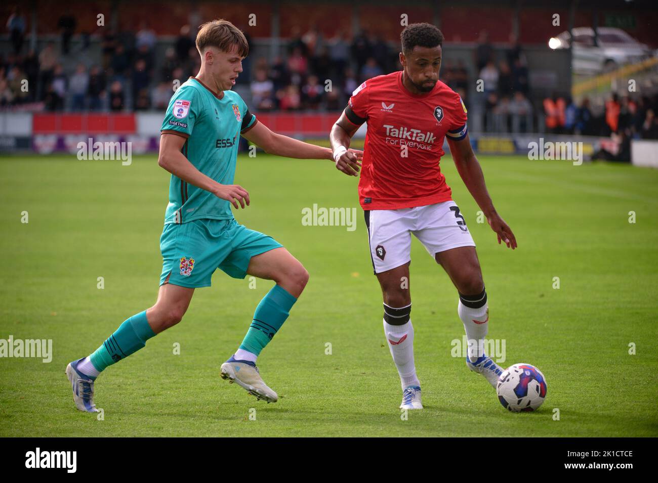 Rhys Hughes of Tranmere Rovers tackles Ibou Touray of Salford City during the Sky Bet League 2 match between Salford City and Tranmere Rovers at Moor Lane, Salford on Saturday 17th September 2022. Stock Photo