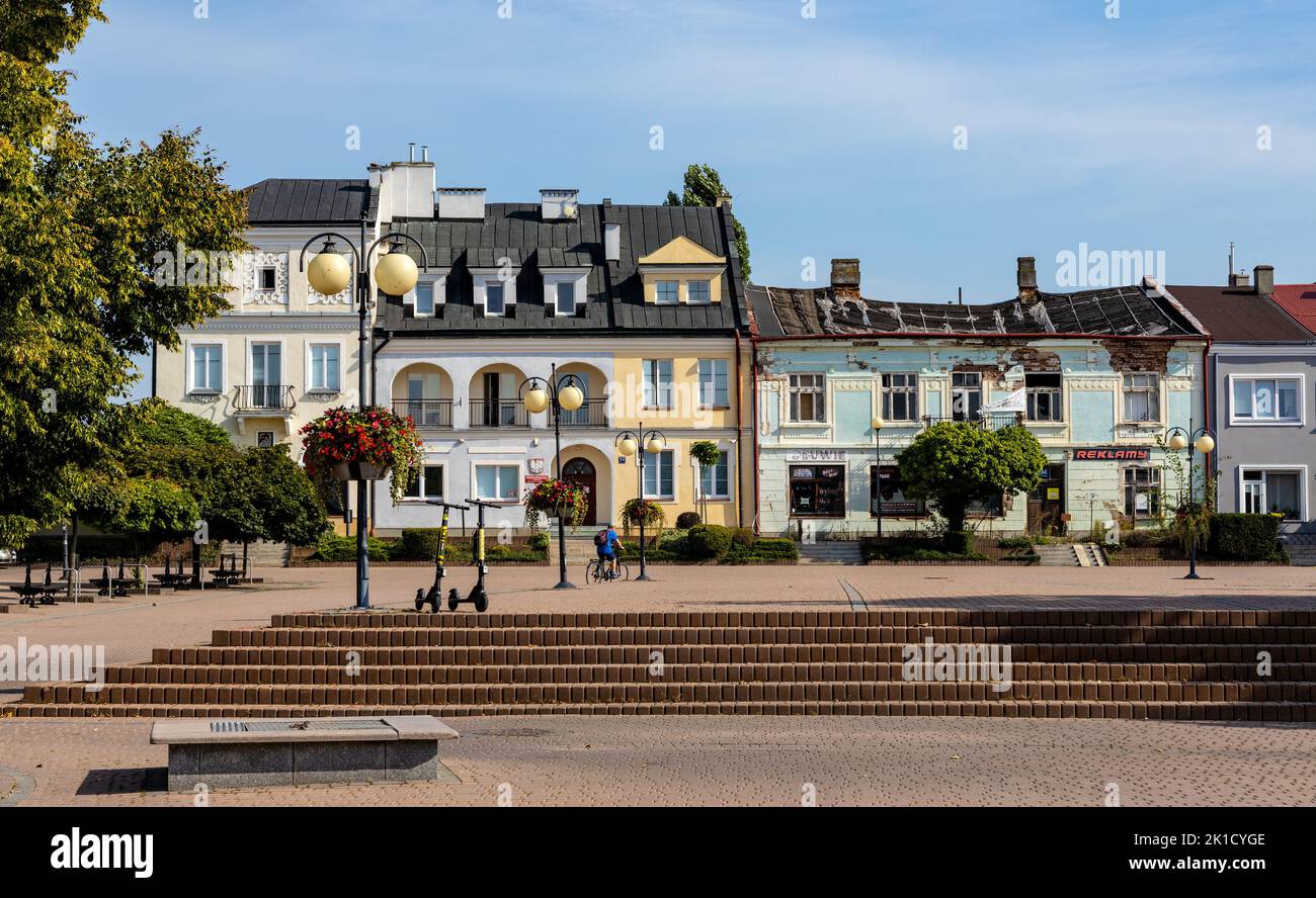 Tarnobrzeg, Poland - August 19, 2022: Historic quarter market square with tenement houses and waterworks in old town quarter of Tarnobrzeg Stock Photo