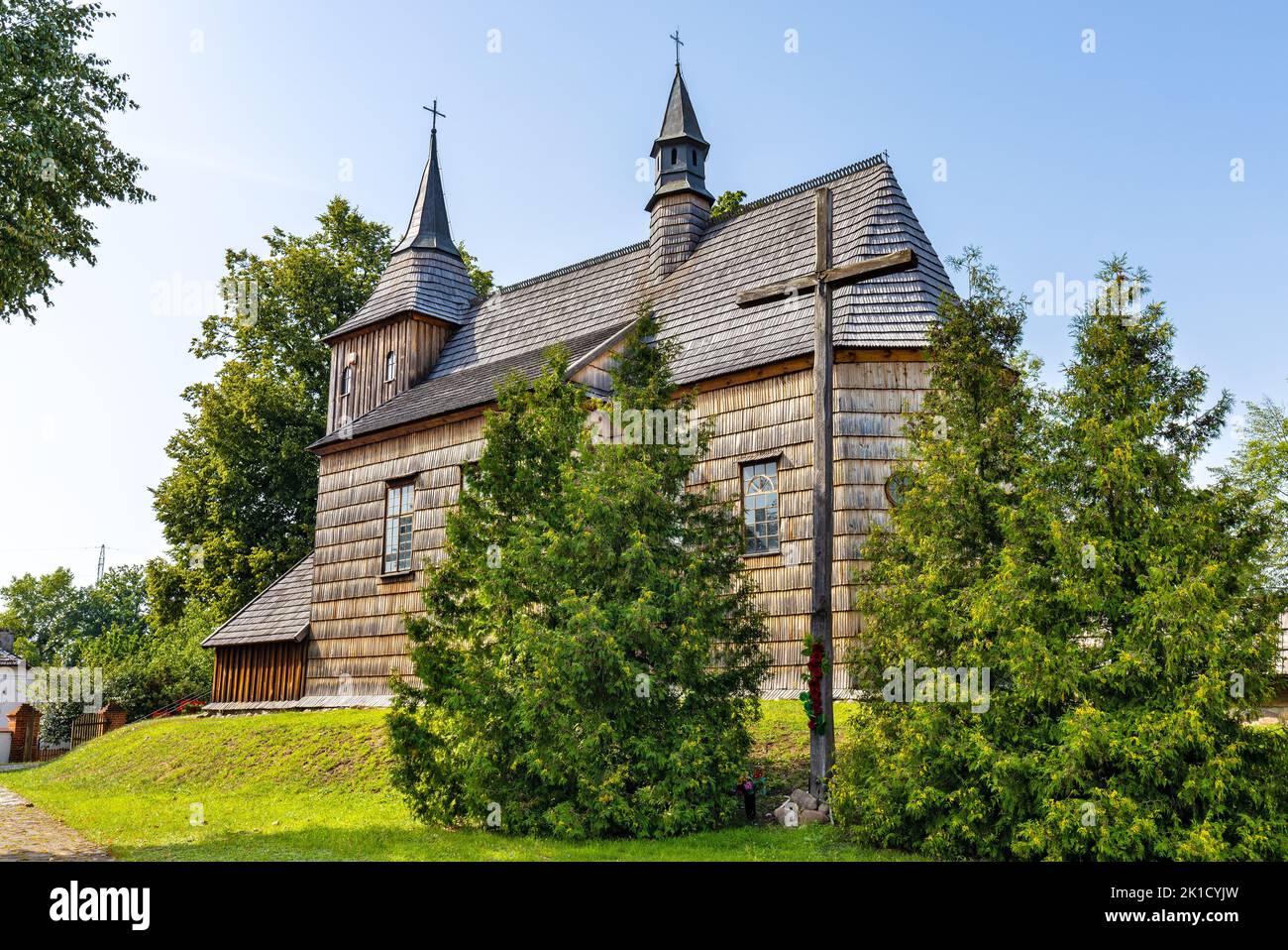 Cmolas, Poland - August 19, 2022: Historic XVII century wooden church of Our Lord Transfiguration in Cmolas village near Mielec in Podkarpacie region Stock Photo