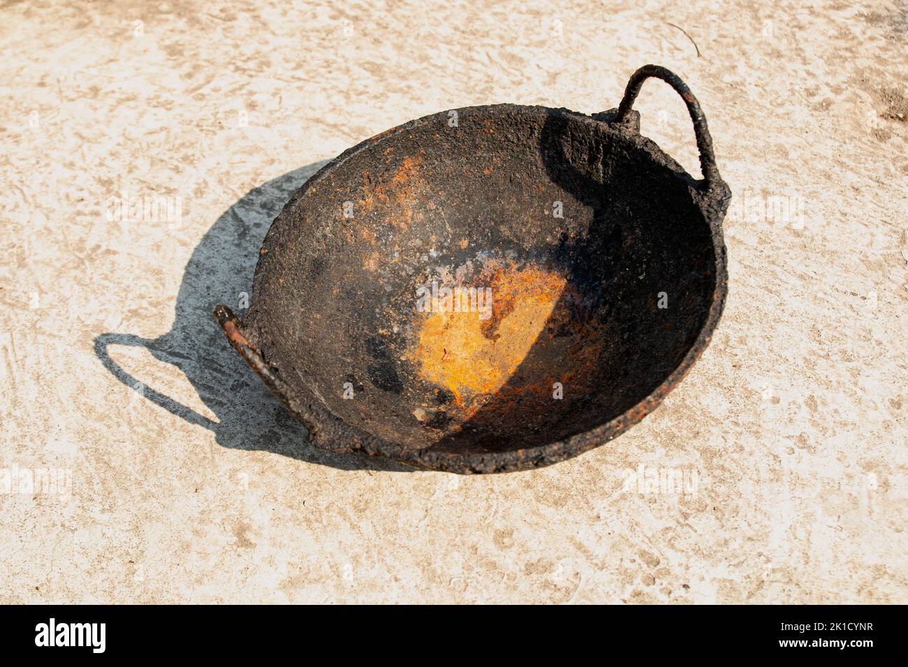 oxidize on cast iron fry pan. corrosion of iron on a pan. Oxidation on