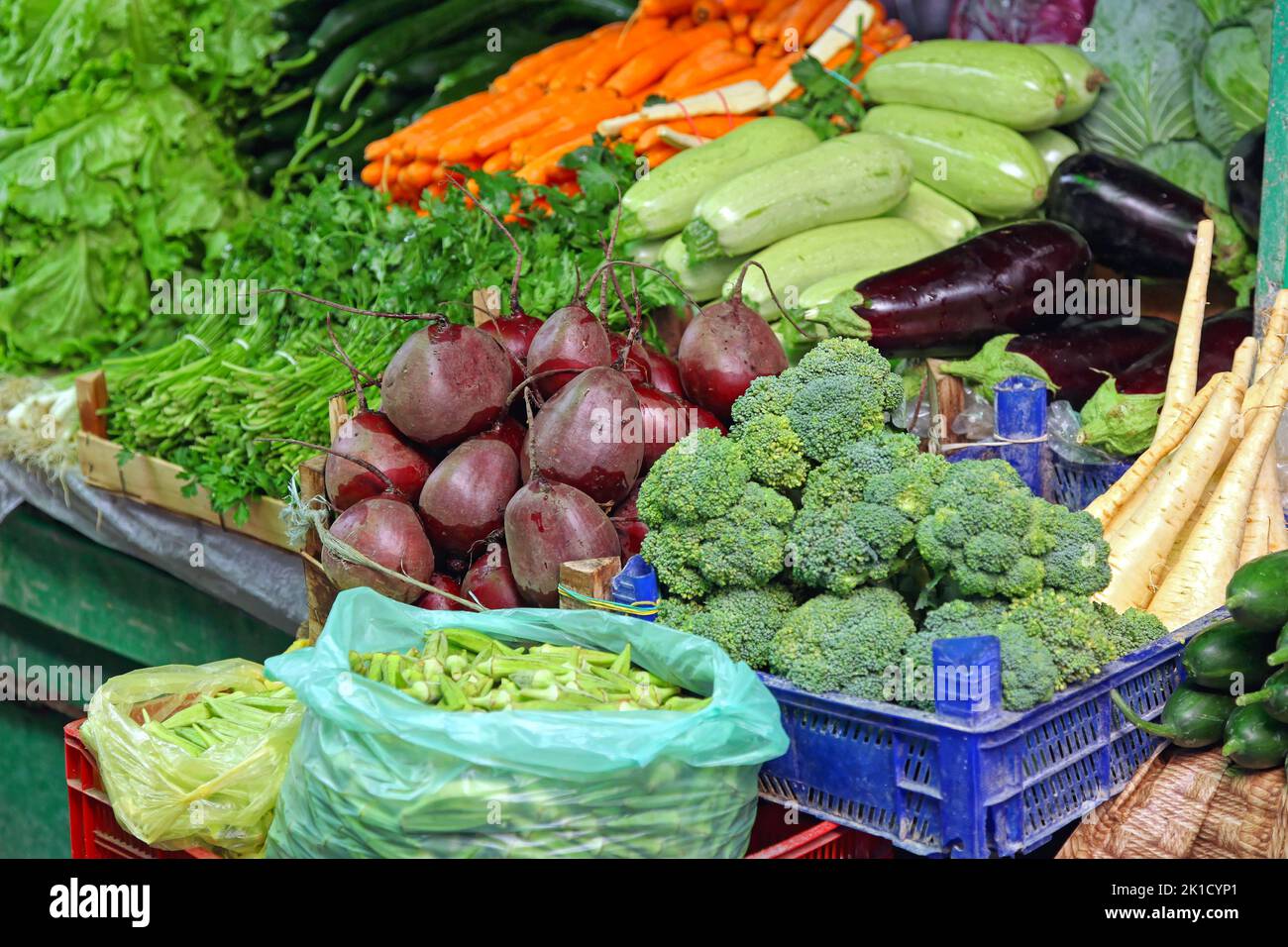 Many fresh vegetables produce at farmers market stall Stock Photo - Alamy