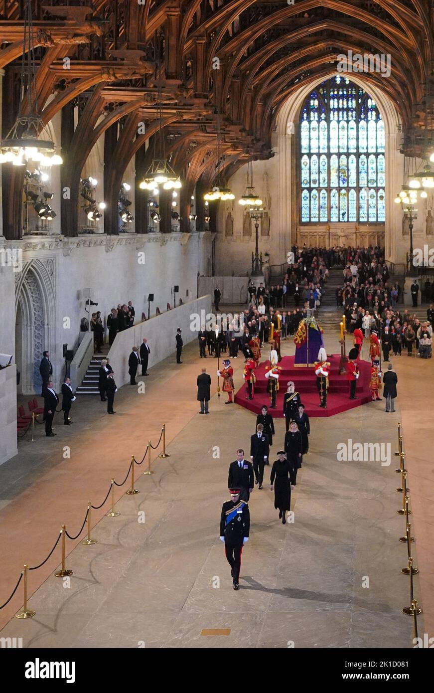 Queen Elizabeth II 's grandchildren (left to right, from bottom) the Prince of Wales, Peter Phillips and Zara Tindall, James, Viscount Severn and Lady Louise Windsor, Princess Eugenie and Princess Beatrice, and the Duke of Sussex, depart after holding a vigil beside the coffin of their grandmother as it lies in state on the catafalque in Westminster Hall, at the Palace of Westminster, London. Picture date: Saturday September 17, 2022. Stock Photo