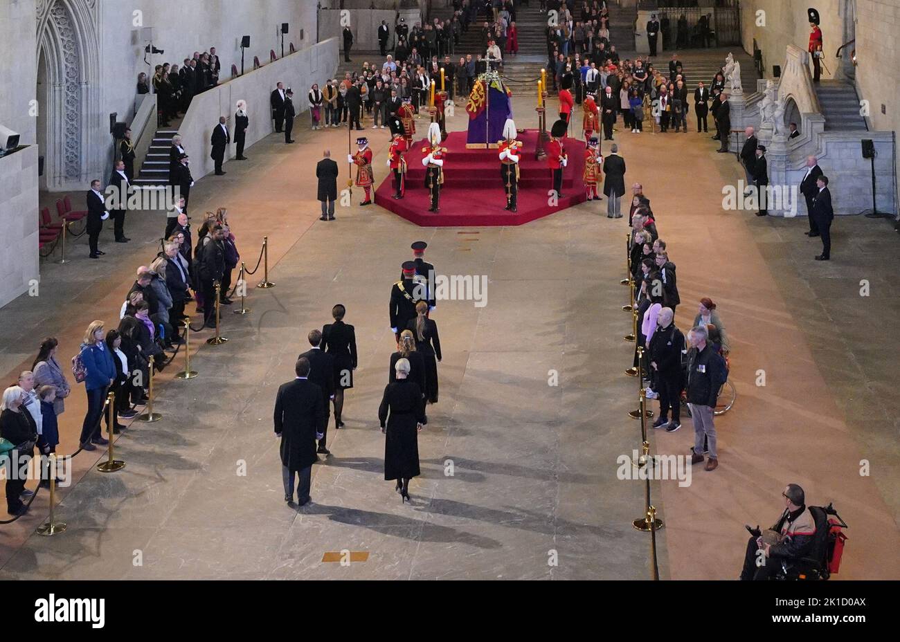 Queen Elizabeth II 's grandchildren (from top, left to right) the Prince of Wales, the Duke of Sussex, Princess Eugenie and Princess Beatrice, James, Viscount Severn and Lady Louise Windsor, Peter Phillips and Zara Tindall arrive for a vigil beside the coffin of their grandmother as it lies in state on the catafalque in Westminster Hall, at the Palace of Westminster, London. Picture date: Saturday September 17, 2022. Stock Photo
