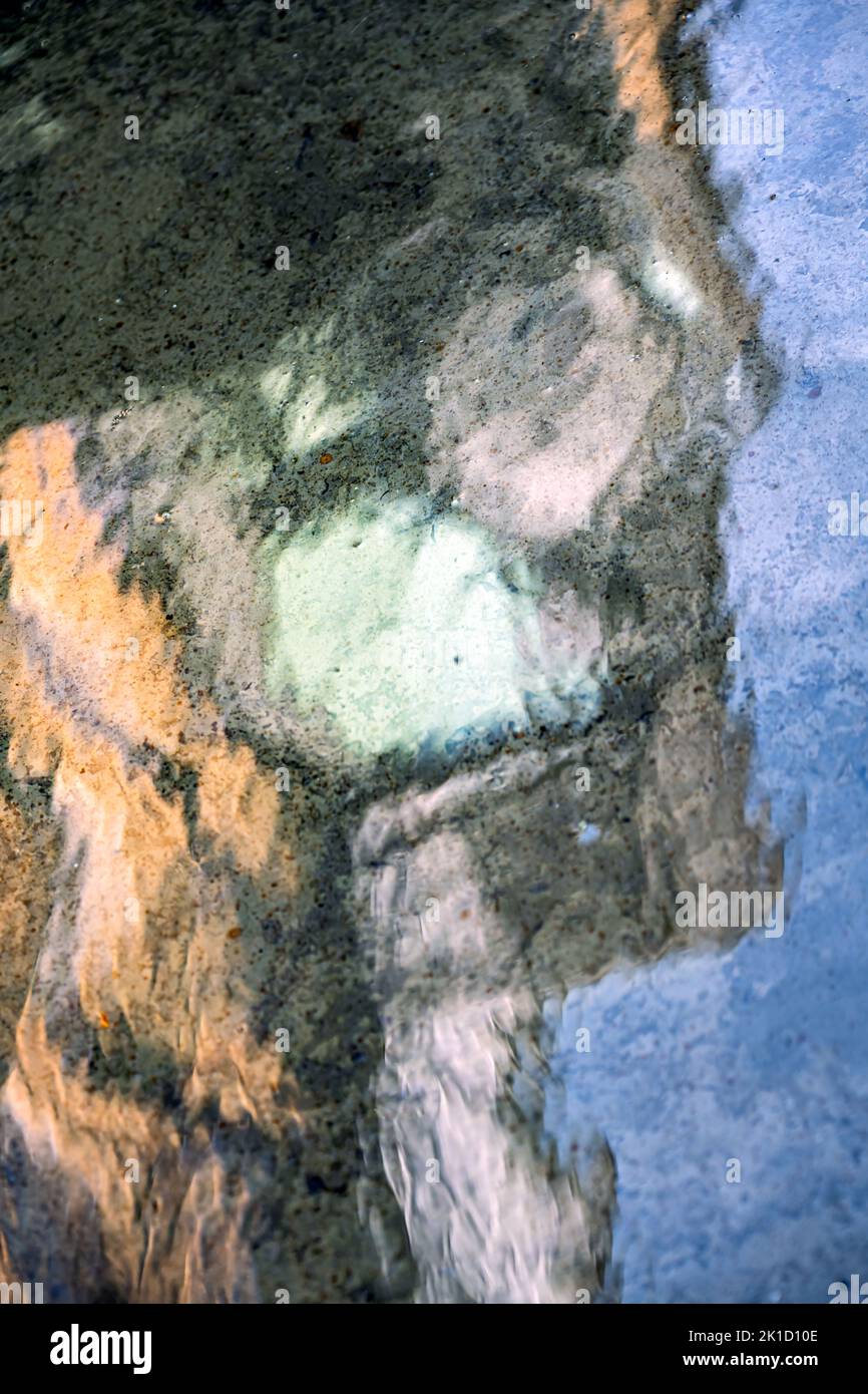 Abstract, reflection in a fountain, use as a background Stock Photo