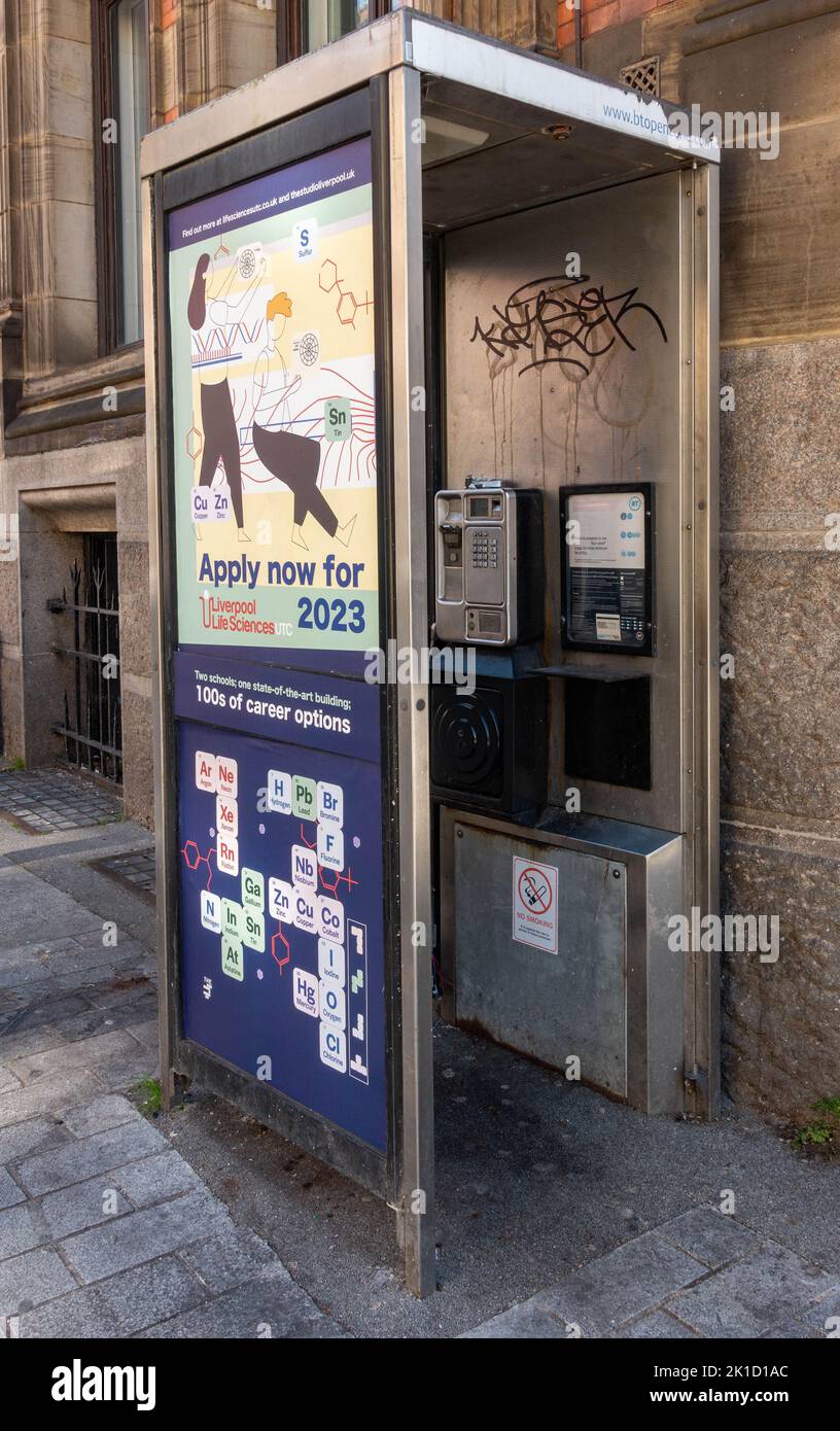 Abandoned telephone kiosk in Liverpool City Centre Stock Photo
