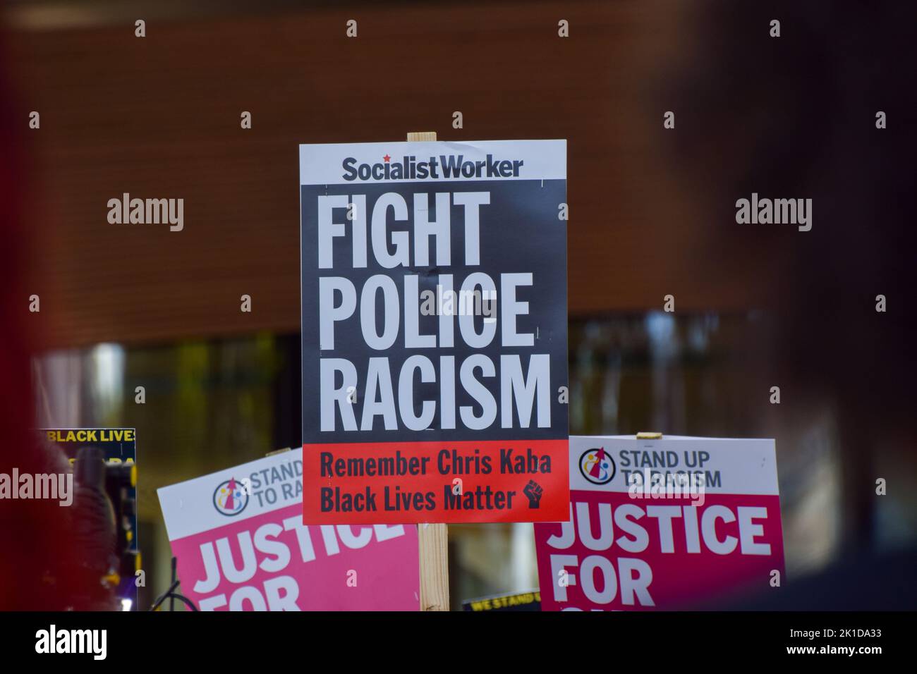 London, UK. 17th Sep, 2022. 'Fight police racism' placard is seen during the demonstration. Protesters gathered outside New Scotland Yard, the Metropolitan Police headquarters, demanding justice for Chris Kaba, who was shot and killed by police despite being unarmed. (Photo by Vuk Valcic/SOPA Images/Sipa USA) Credit: Sipa USA/Alamy Live News Stock Photo