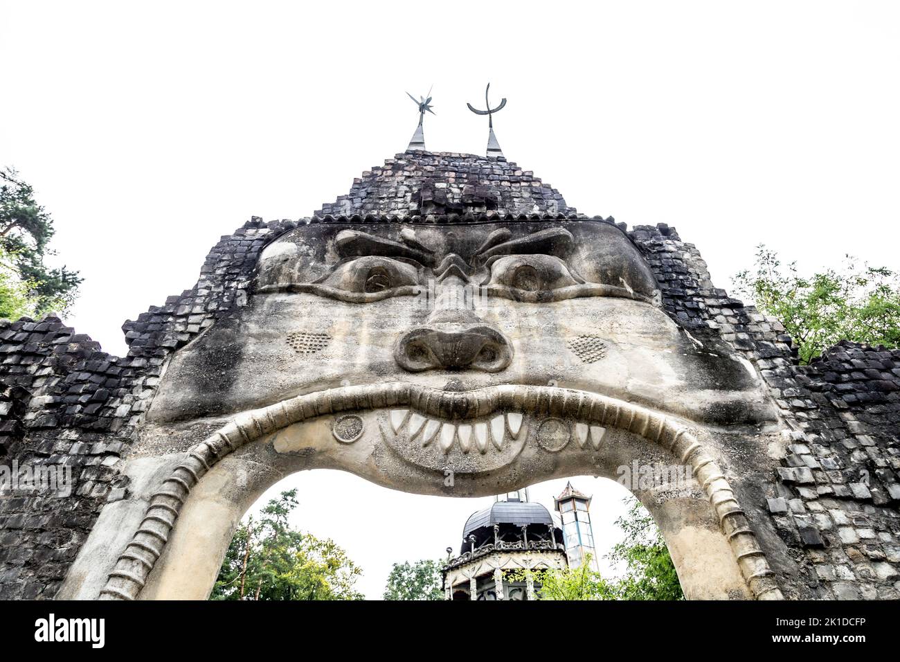 Concrete Day and Night gateway with a face at Bruno Weber Park, Dietikon, Switzerland Stock Photo