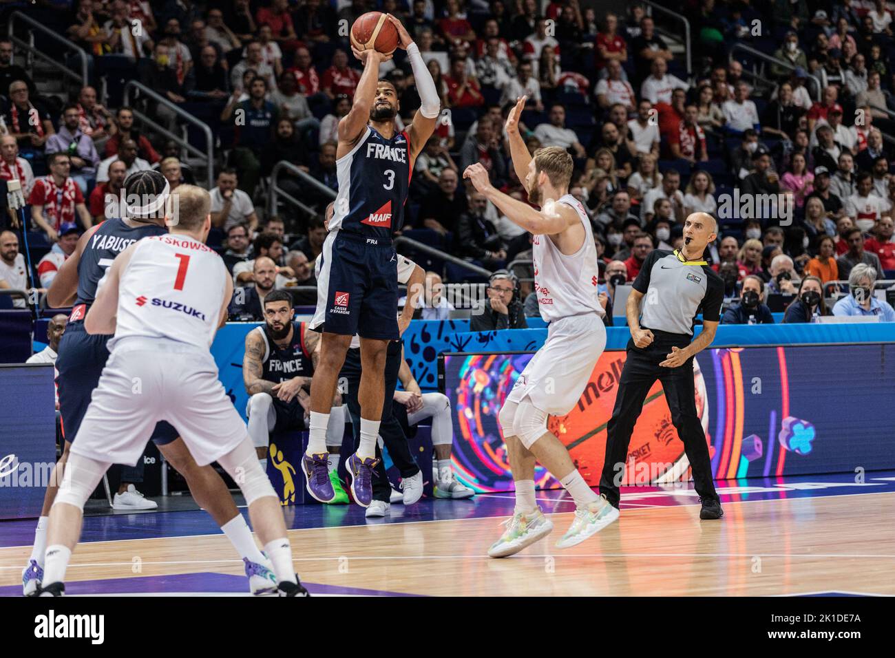 Berlin, Germany. 16th Sep, 2022. Amath M'Baye (C) of France and Michal Michalak (R) of Poland seen in action during the semifinal of the FIBA Eurobasket 2022 between France and Poland at Mercedes Benz arena. Final score; France 95:54 Poland. (Photo by Nicholas Muller/SOPA Images/Sipa USA) Credit: Sipa USA/Alamy Live News Stock Photo