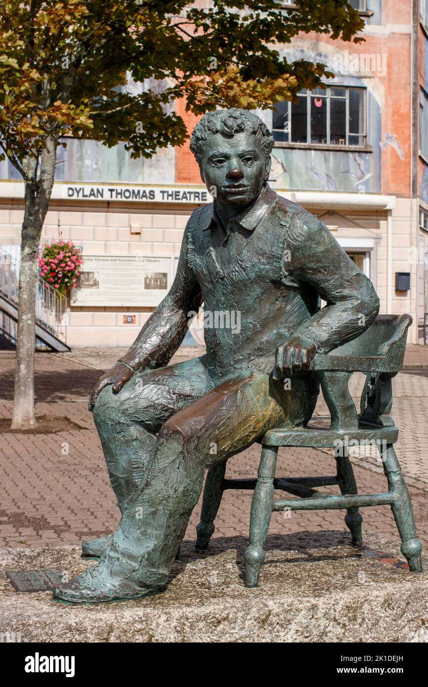 The statue by John Doubleday’s of Dylan Thomas situated in Dylan Thomas Square infront of the Dylan Thomas Theatre in Swansea. Stock Photo
