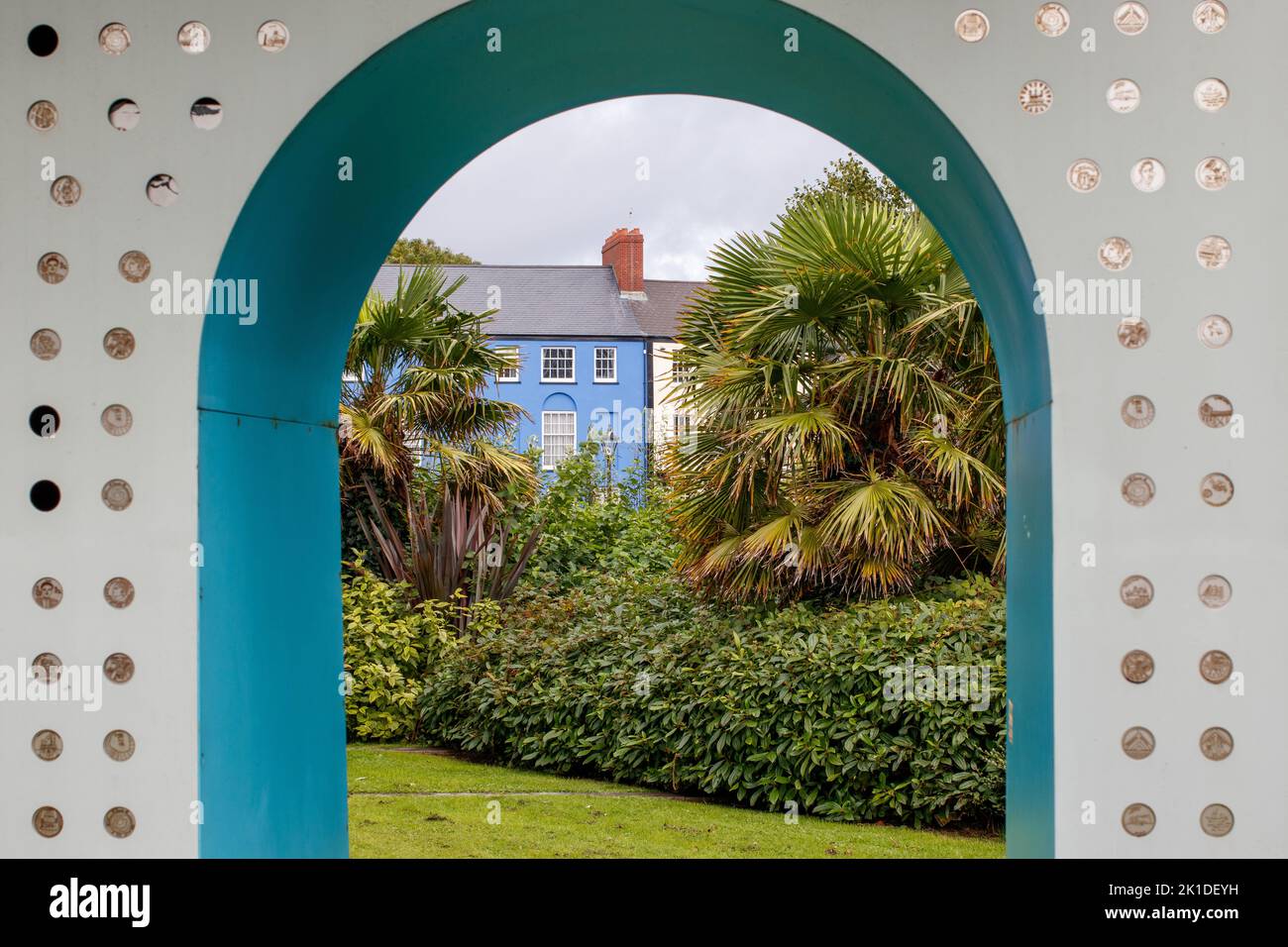 The view through a sculpture in Museum Park looking towards Somerset Place where a blue house stands. Stock Photo