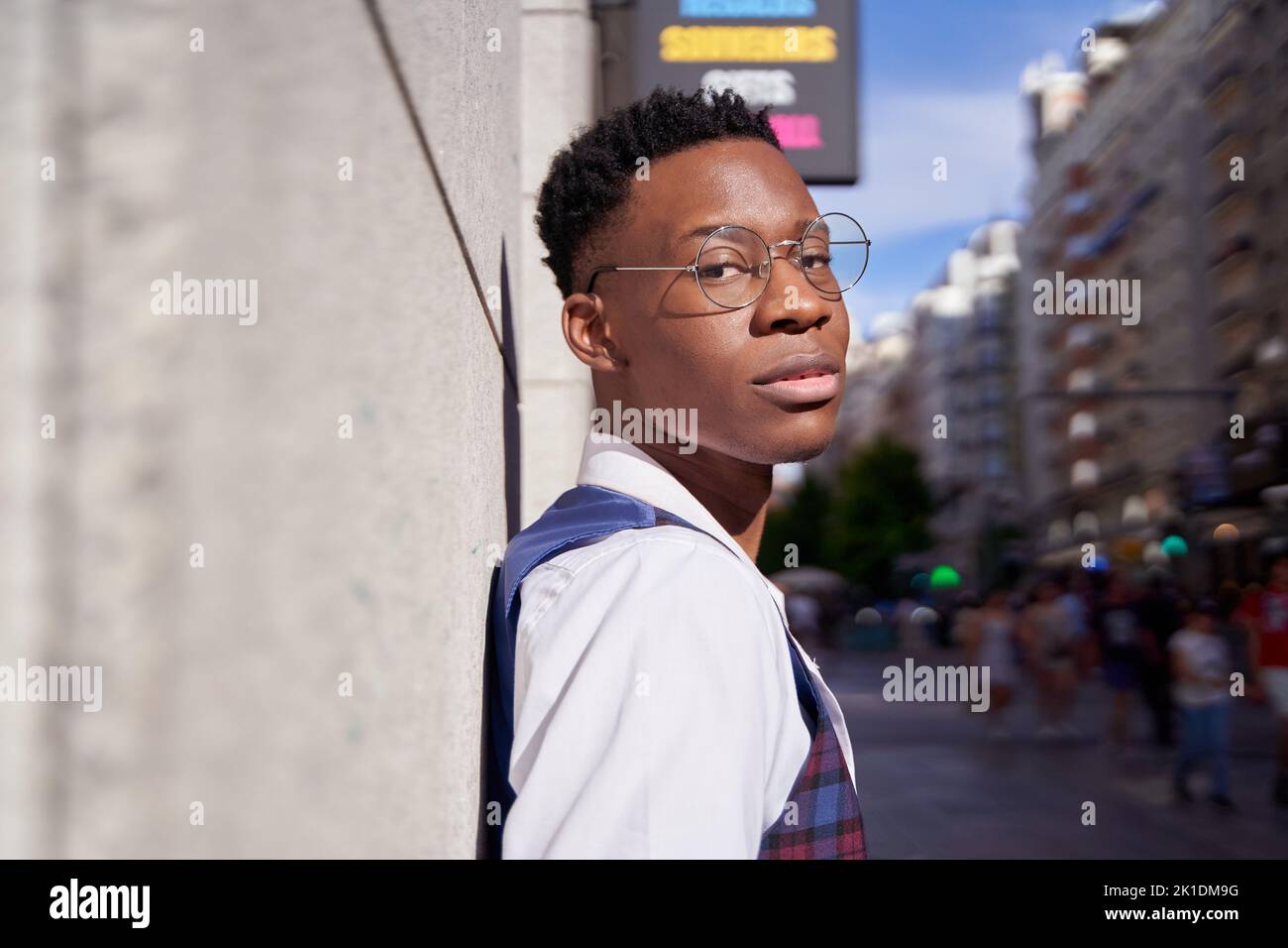 Portrait of stylish young African American man looking at camera in the city. Stock Photo