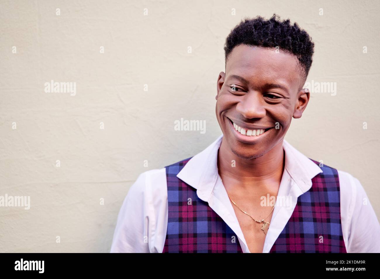 close-up of a stylish African-American man laughing out loud Stock Photo