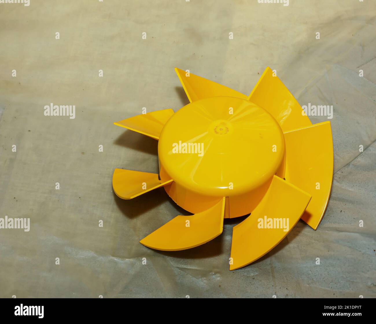 Parts of a kitchen exhaust fan after cleaning and washing. The process of cleaning a very dirty