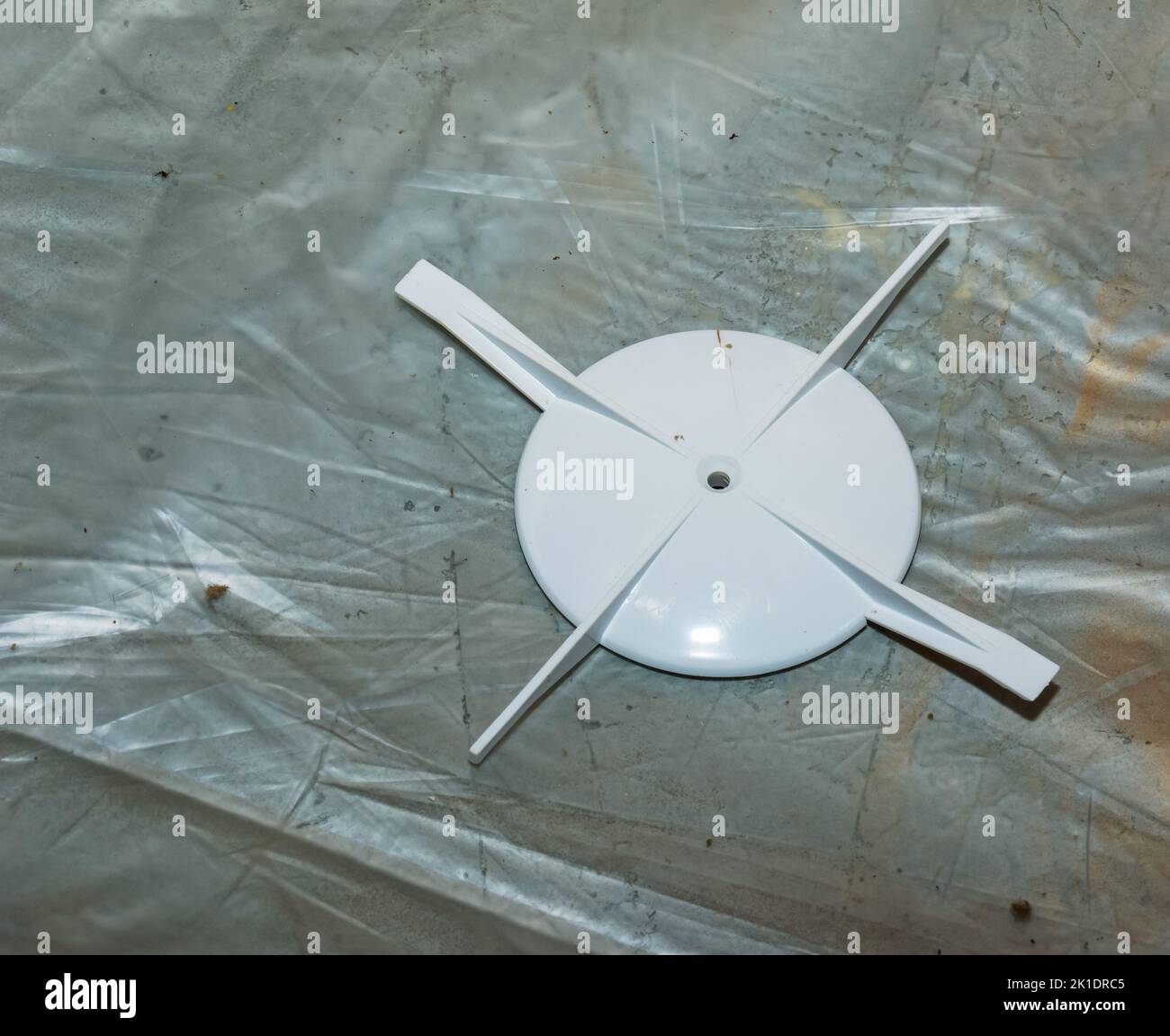 Parts of a kitchen exhaust fan after cleaning and washing. The process of cleaning a very dirty