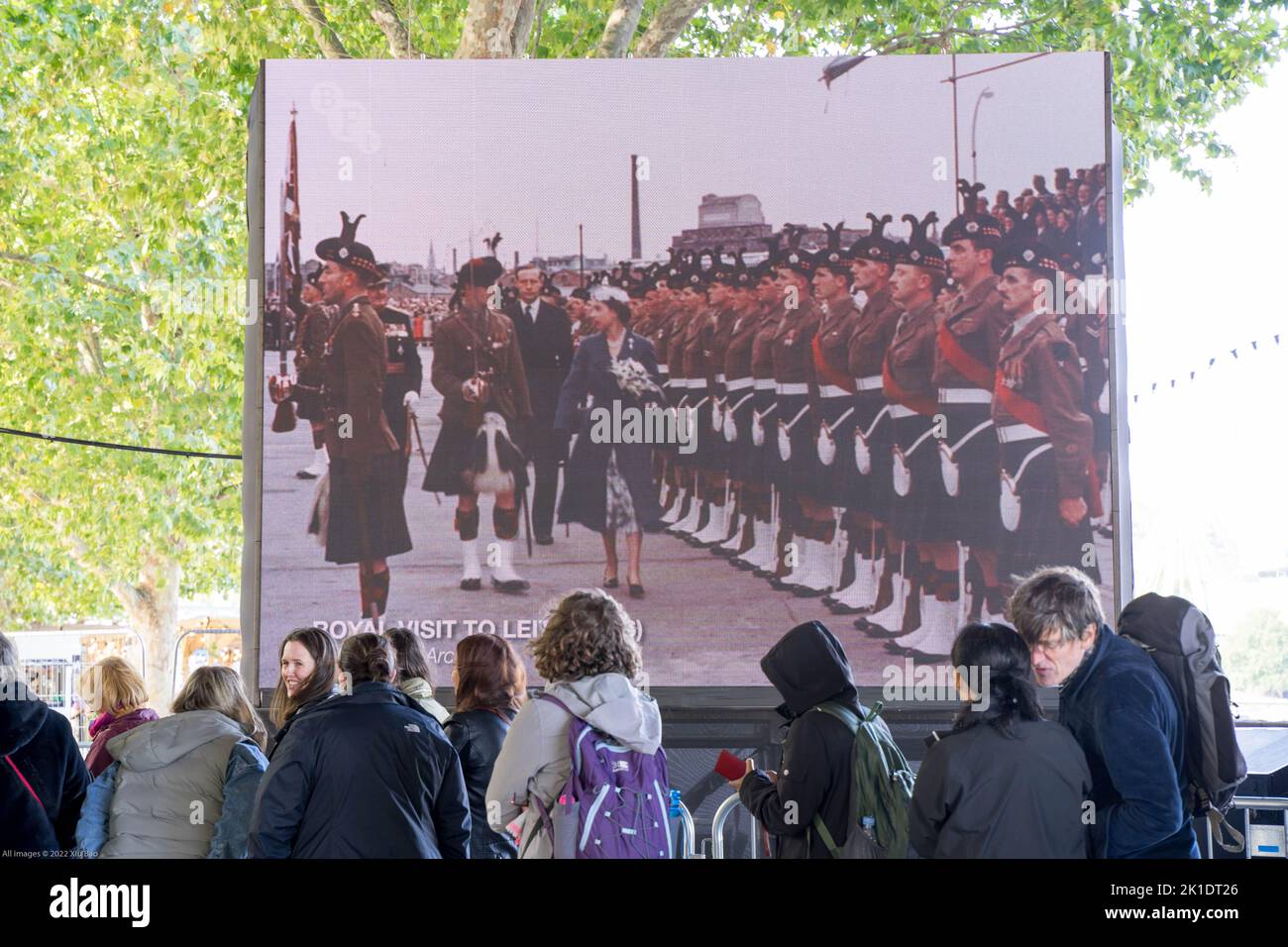 people joining the queues along the south bank of the River Thames to pay their respect to the queen lying-in-state at Westminster hall London UK Stock Photo