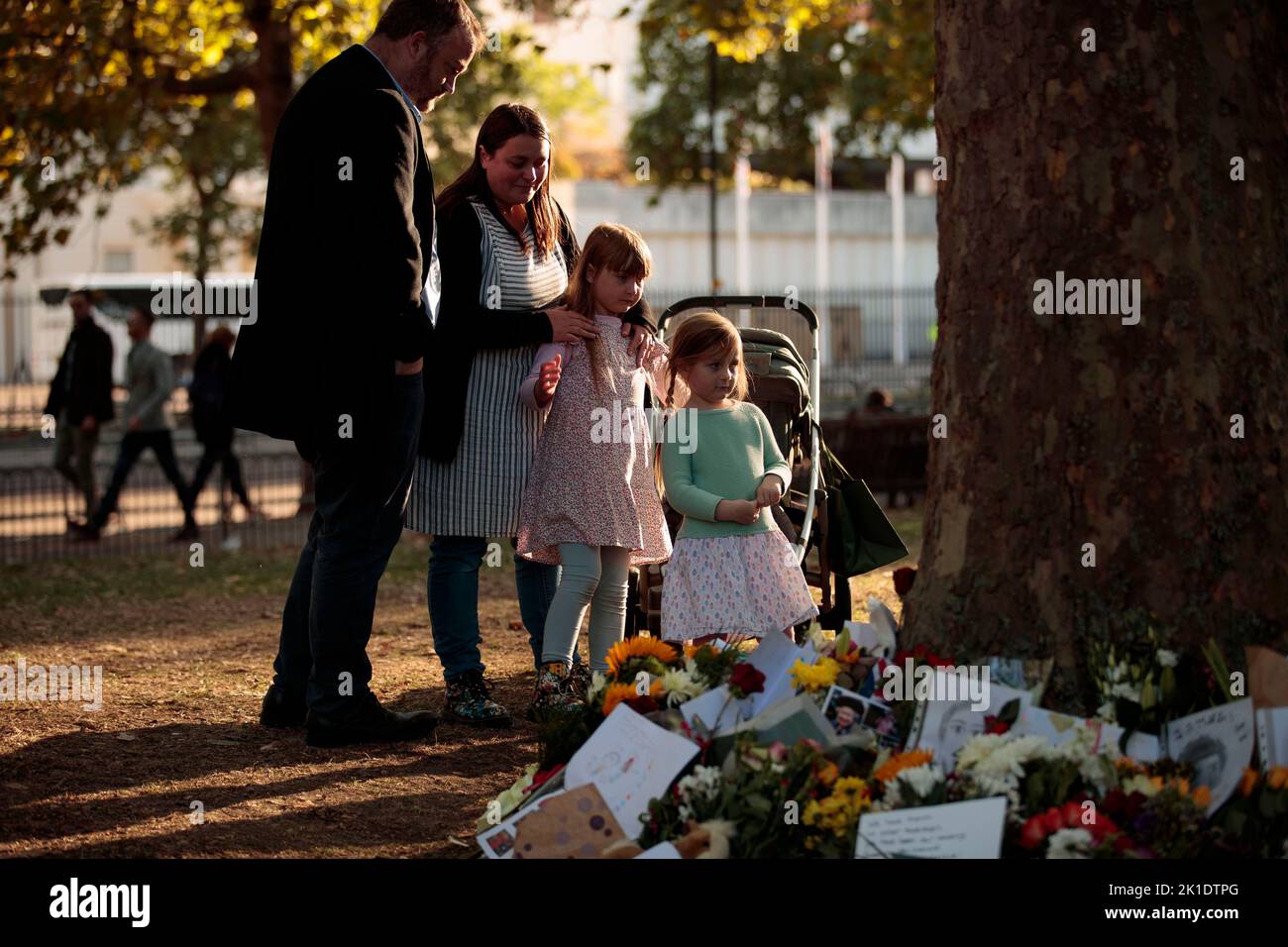 London, UK. 17th Sep, 2022. Mr. and Mrs Spencer with her two daughters Esther age 4 and sister Phoebe age 7 reacts after place tributes at St. James park, following the death of Britain's Queen Elizabeth in London, Britain, September 17, 2022 (Credit Image: © May James/ZUMA Press Wire) Stock Photo