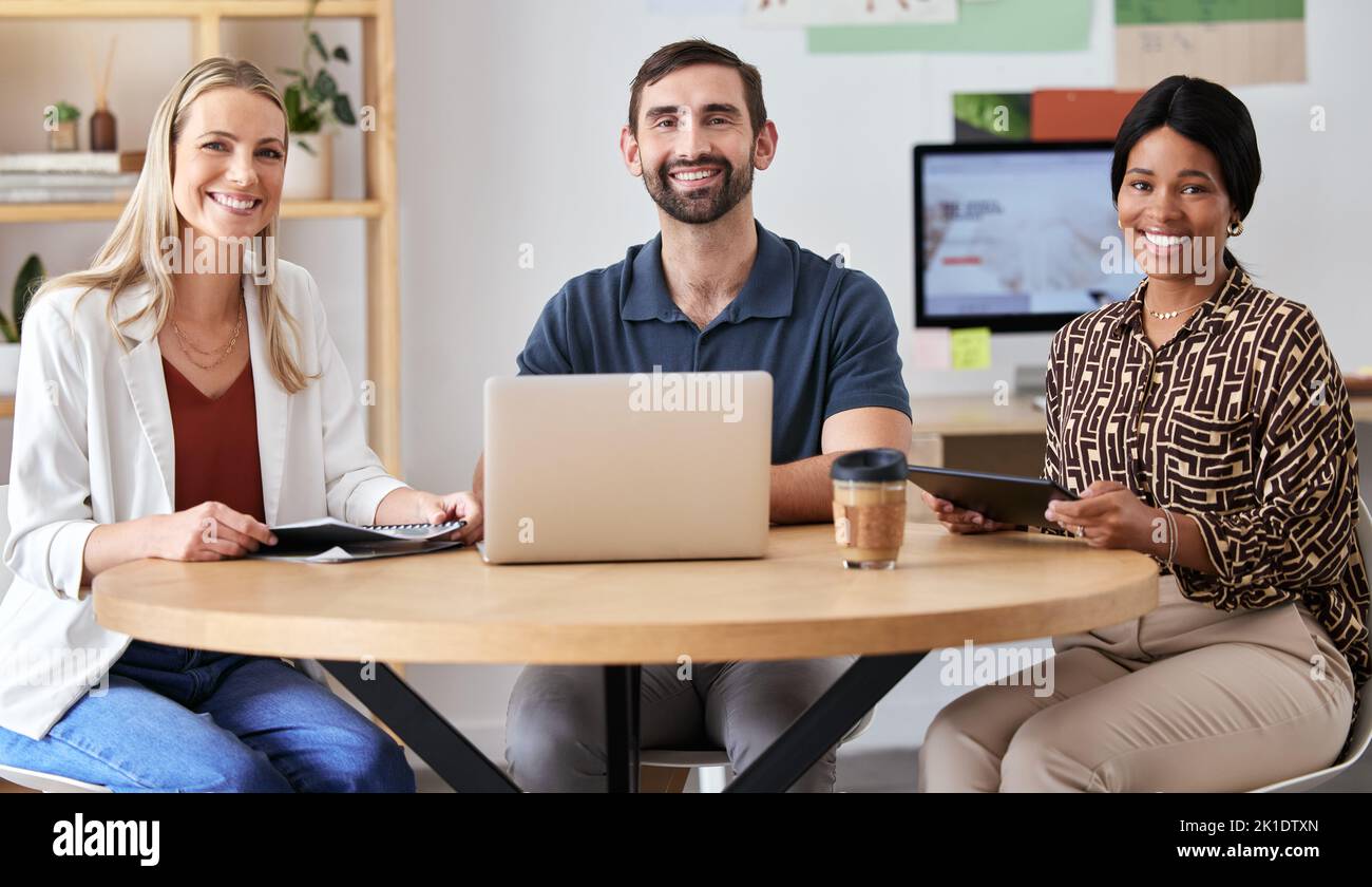 Teamwork, planning and collaboration with business people in a meeting, happy while working together. Young, diverse partner brainstorming, discussing Stock Photo