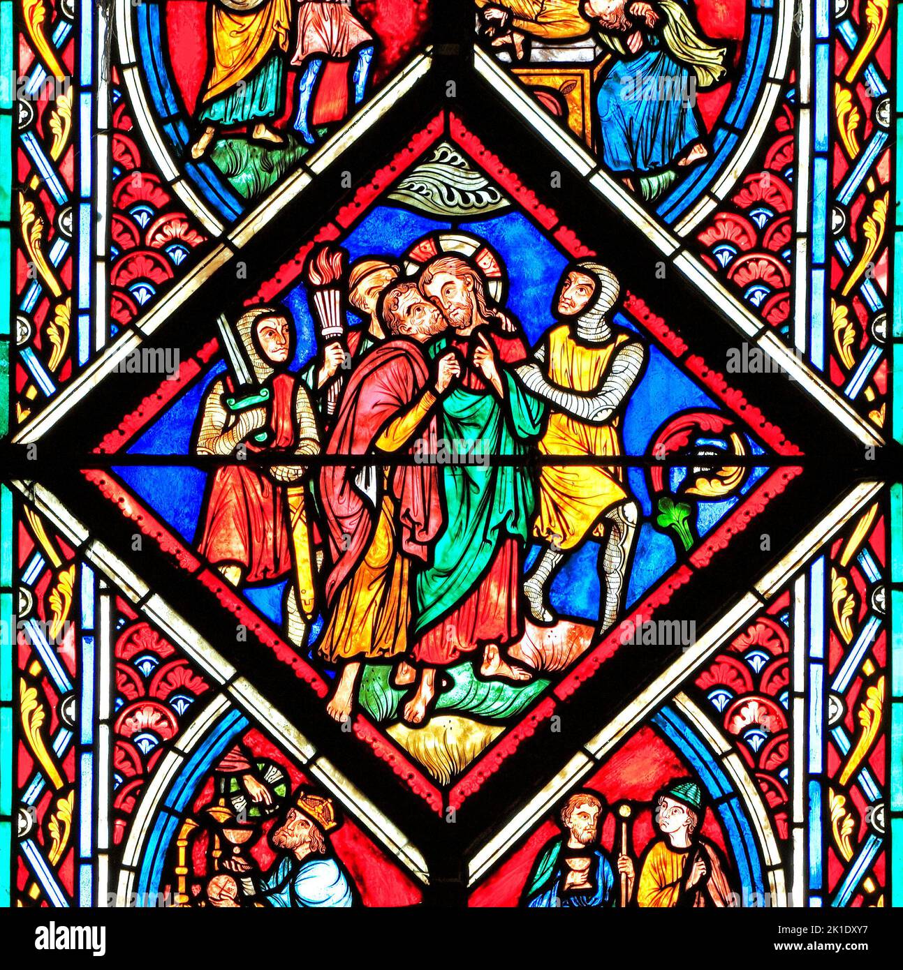 Judas betrays Jesus, with a kiss, in the Garden of Gethsemane, stained glass by Didron of Paris, 1860, Feltwell, Norfolk, detail from Passion Window Stock Photo
