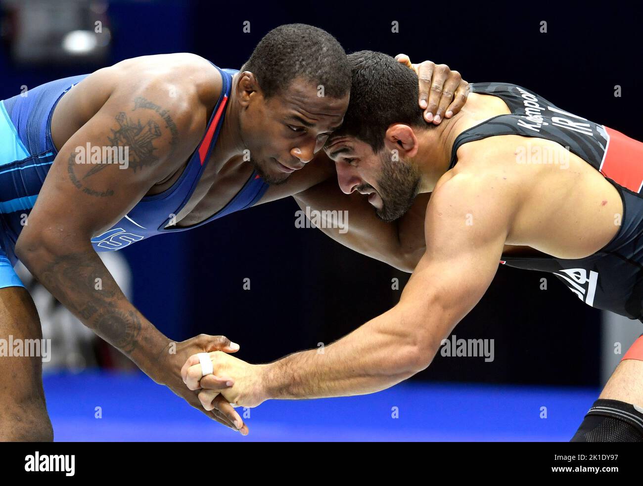 Belgrade. 17th Sep, 2022. Iran's Kamran Ghorban Ghasempour (R) fights against J'Den Michael Tbory Cox of the United States during the men's 92kg category freestyle final at the Wrestling World Championships in Belgrade, Serbia on Sept. 17, 2022. Credit: Predrag Milosavljevic/Xinhua/Alamy Live News Stock Photo