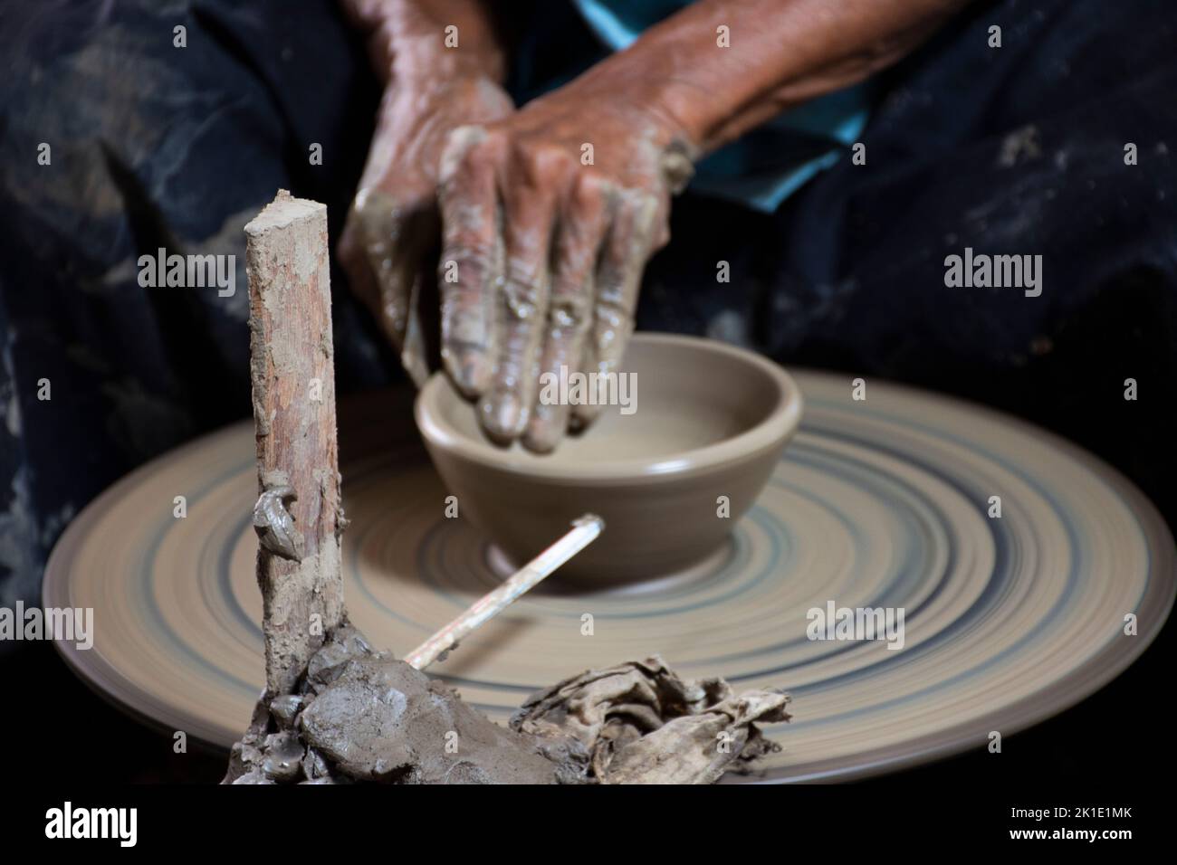 Thai craftsmanship technician or professional potter use machine