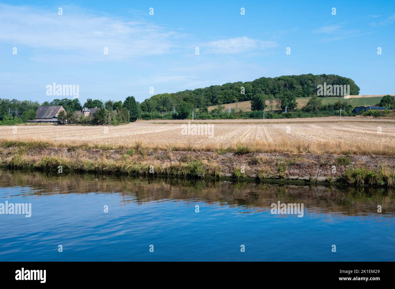View over the River Sambre, agriculture fields and farmhouses, Floreffe, Belgium Stock Photo