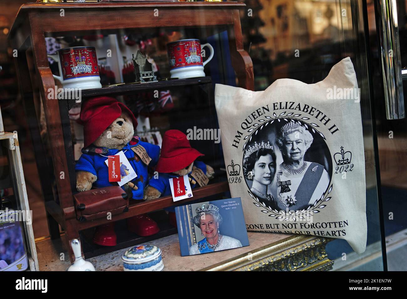 Royal memorabilia in shop window near Buckingham Palace in London, following the death of Queen Elizabeth II. Picture date: Sunday September 18, 2022. Stock Photo