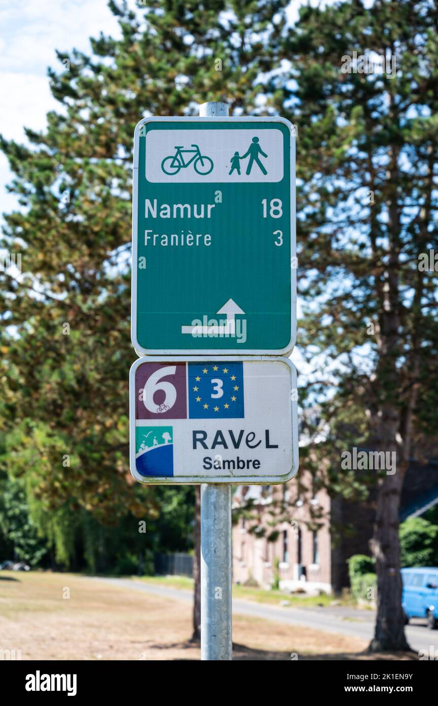Franiere, Wallon Region, Belgium, 07 29 2022 - Direction sign for the Ravel biking and walking trail at the banks of the River Sambre Stock Photo