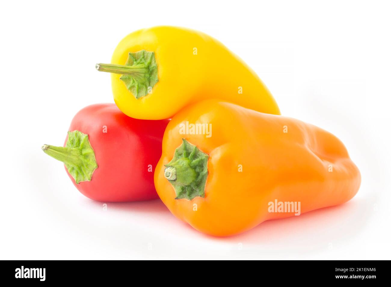 yellow, red and orange mini sweet peppers isolated on white Stock Photo