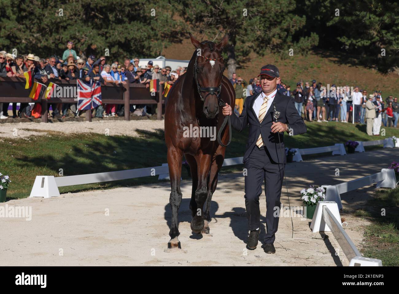 Rocca Di Papa, Italy. 18th Sep, 2022. Equestrian sport: World Championship, Eventing, Constitutional test. Eventing rider Michael Jung (Germany) leads his horse Chipmunk FRH. The German eventing horses passed the veterinary examination without any complaints. The event will take place on the Pratoni del Vivaro plateau. Credit: Friso Gentsch/dpa/Alamy Live News Stock Photo