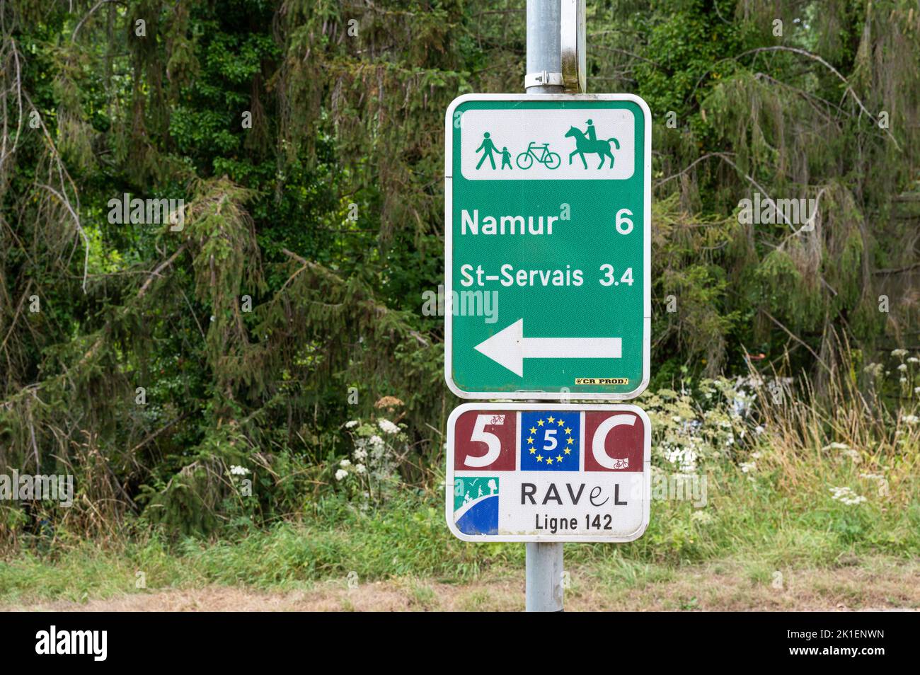 Saint-Servais, Wallon Region, Belgium - 08 01 2022 - Direction sign with distance indication at the Ravel biking trail Stock Photo
