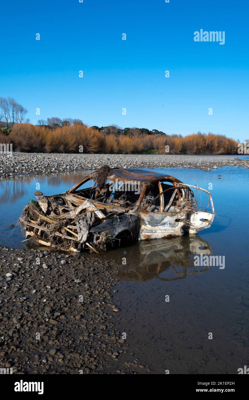 Wrecked car in Pohangina River, Ashurst, Manawatu, North Island, New Zealand Stock Photo