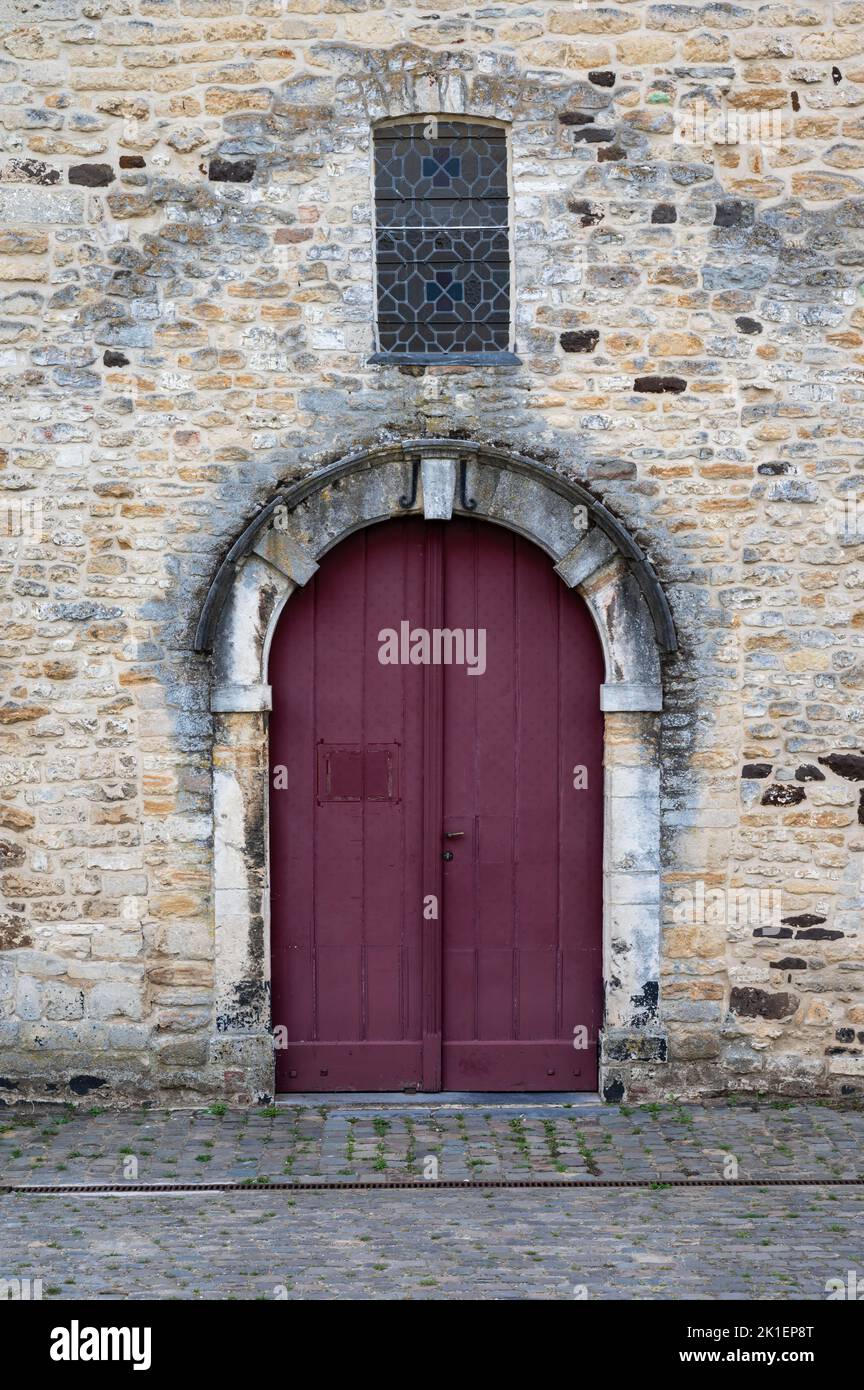 Oud-Heverlee, Flemish Brabant, Belgium - 08 21 2022 - Wooden entrance door of the chapel Stock Photo