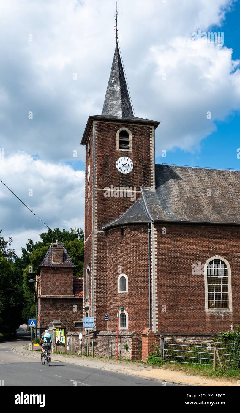 Grez-Doiceau, Wallon Region, Belgium , 08 01 2022 - Brick stone catholic church in the village Stock Photo