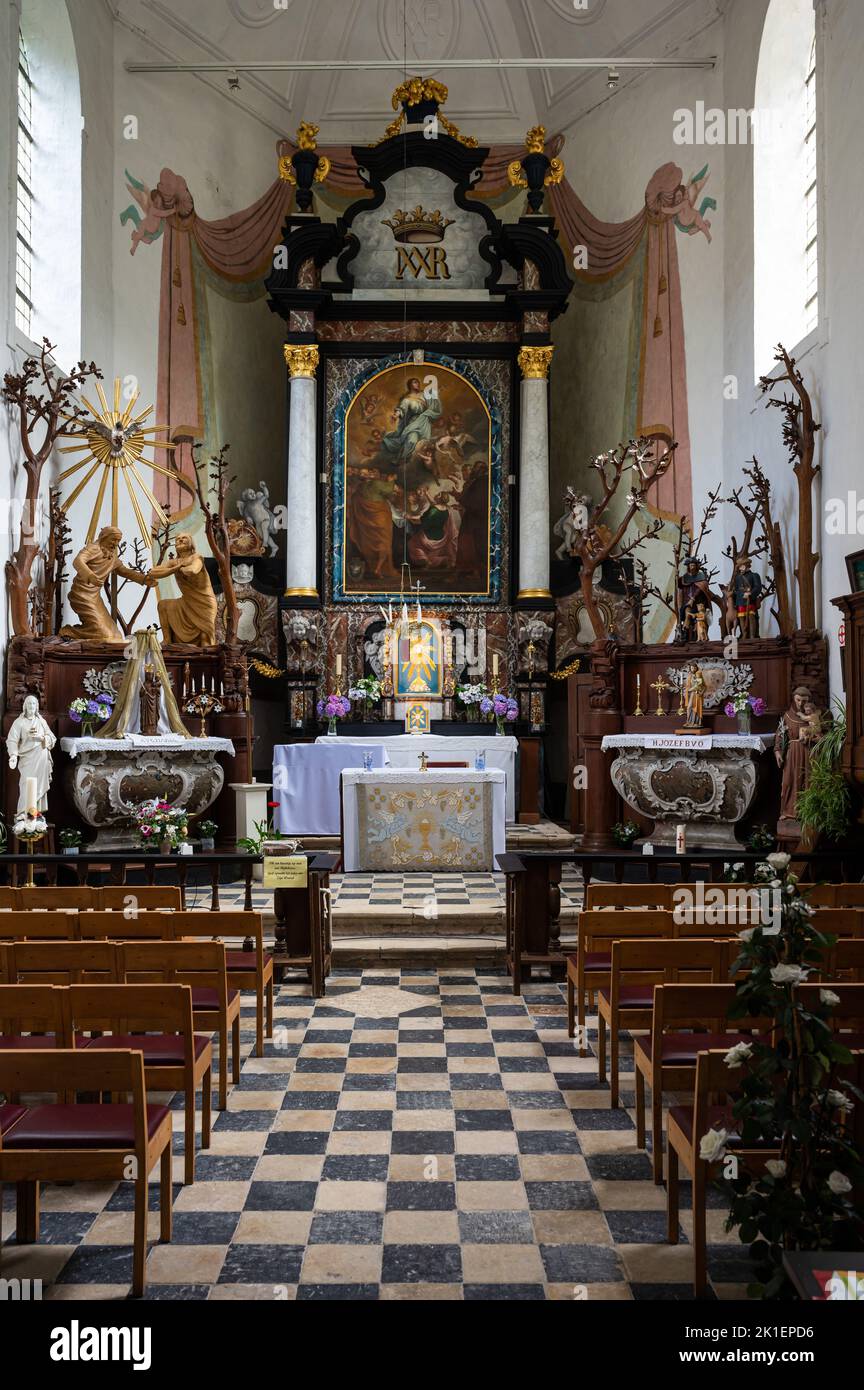 Oud-Heverlee, Flemish Brabant, Belgium - 08 2 1 2022 - Interior of a catholic chapel and altar Stock Photo