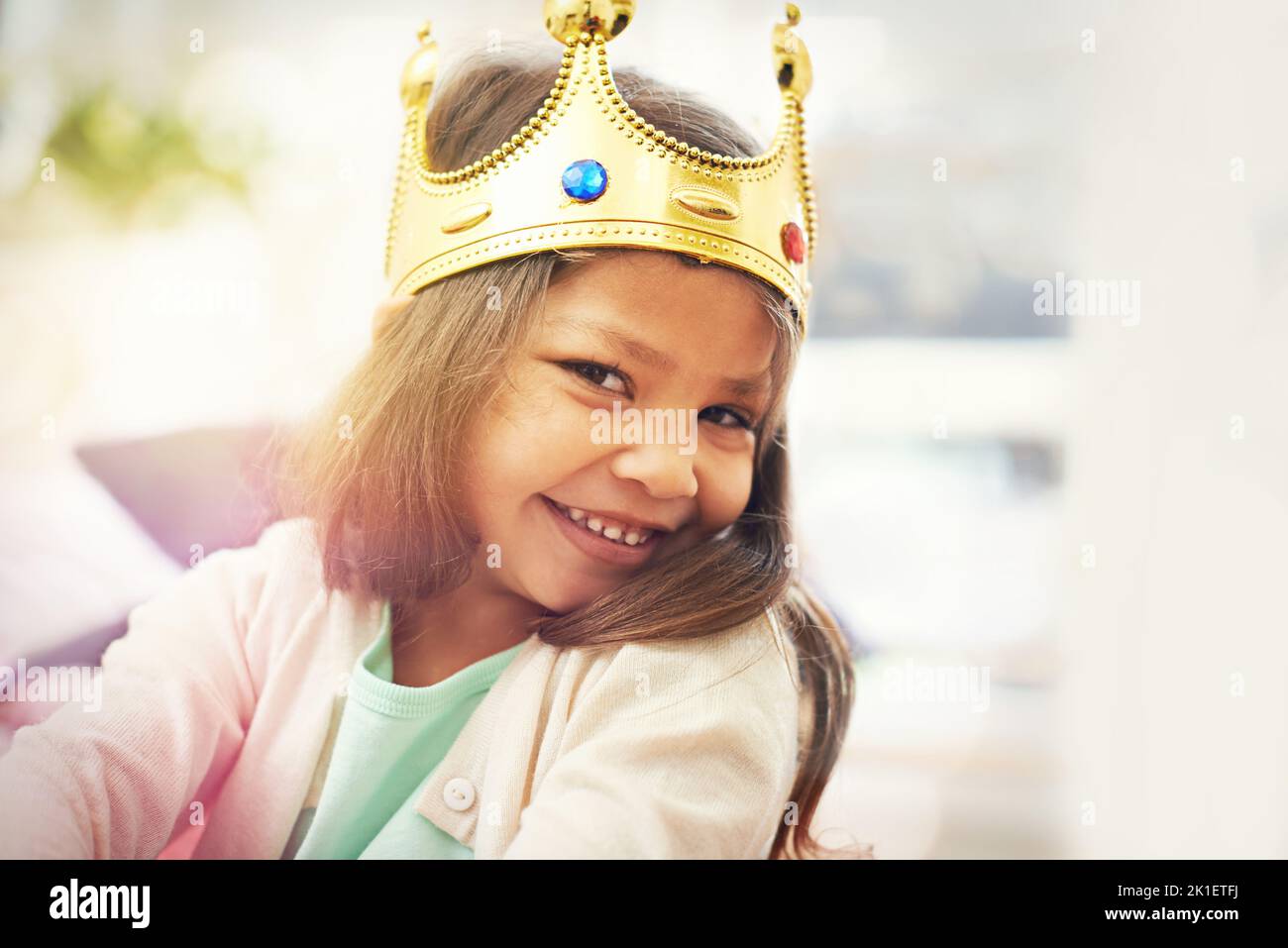 Its not easy being a princess. A cute little girl dressed up as a